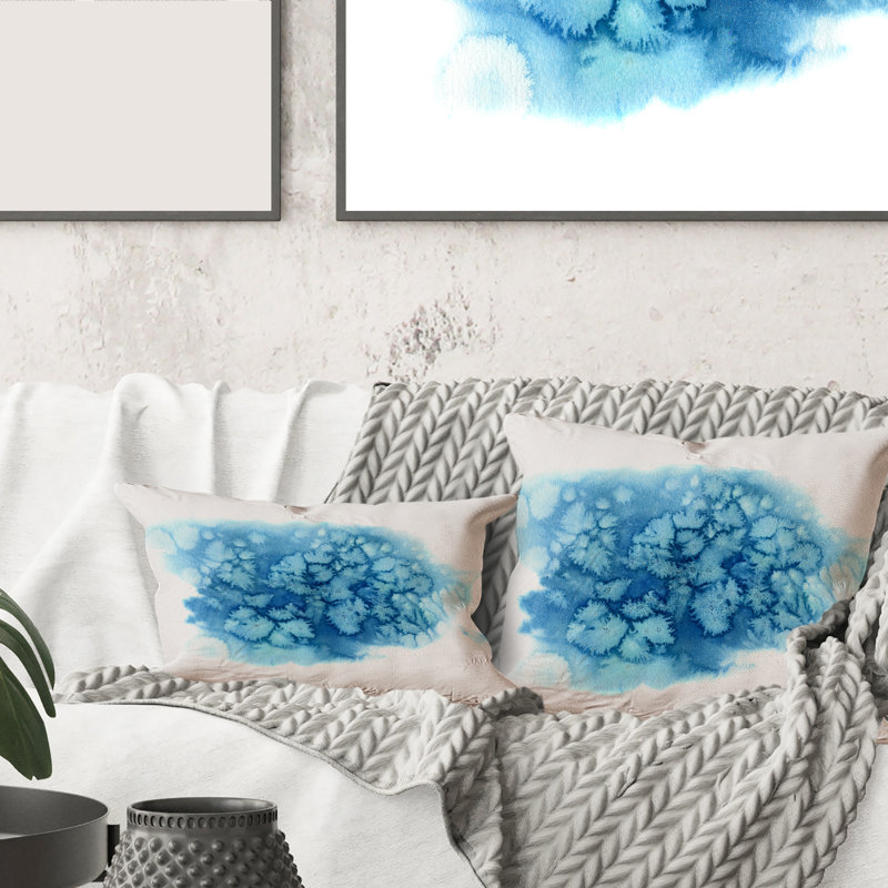 Coussin décoratif à imprimé abstrait bleu turquoise