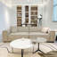 Canapé modulaire en cuir véritable couleur crème avec coussins.-1157689891