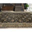 Hand Knotted Wool Area Rug in Black And Gold