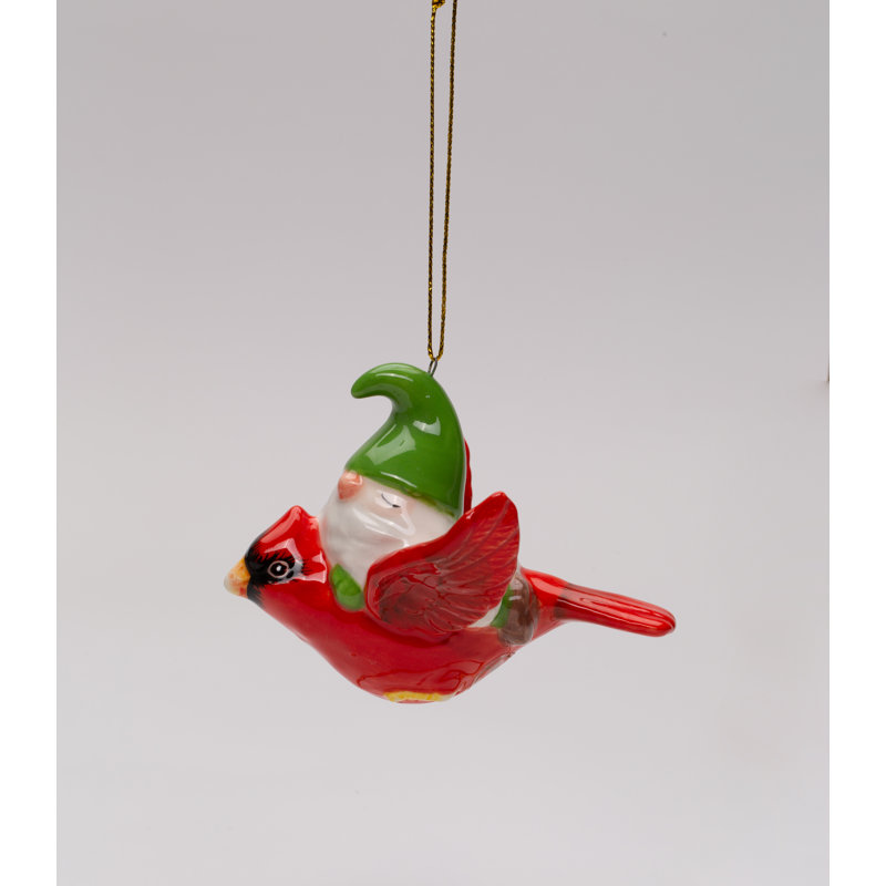 Ornement en forme de gnome chevauchant un cardinal