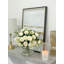 Arrangement de pivoines roses dans un vase