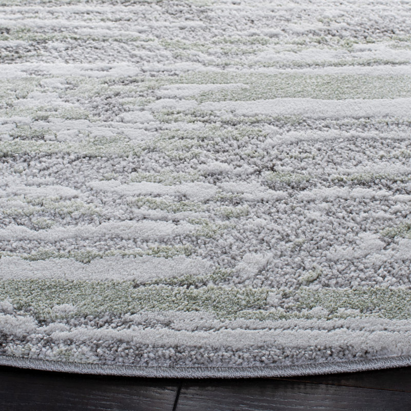 Round 6'7" Grey and Green Abstract Synthetic Area Rug