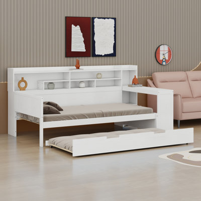 Lit de jour avec tablettes de rangement, lit gigogne et bureau d'étude intégré