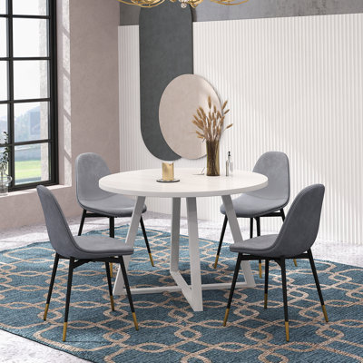 Élégant ensemble de salle à manger 5 pièces avec table à tréteaux et 4 chaises, idéal pour créer une atmosphère de salle à manger harmonieuse