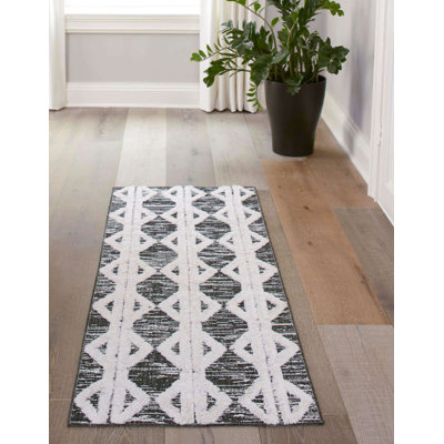 Tapis contemporain contemporain Eiryn de couleur noire