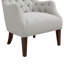 Fauteuil à oreilles capitonné