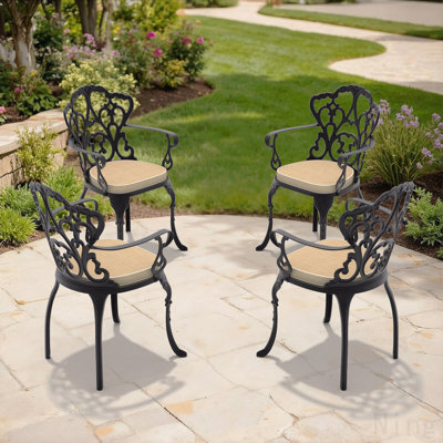 Chaise de patio en aluminium coulé 4 pièces avec cadre noir et coussins blanc cassé