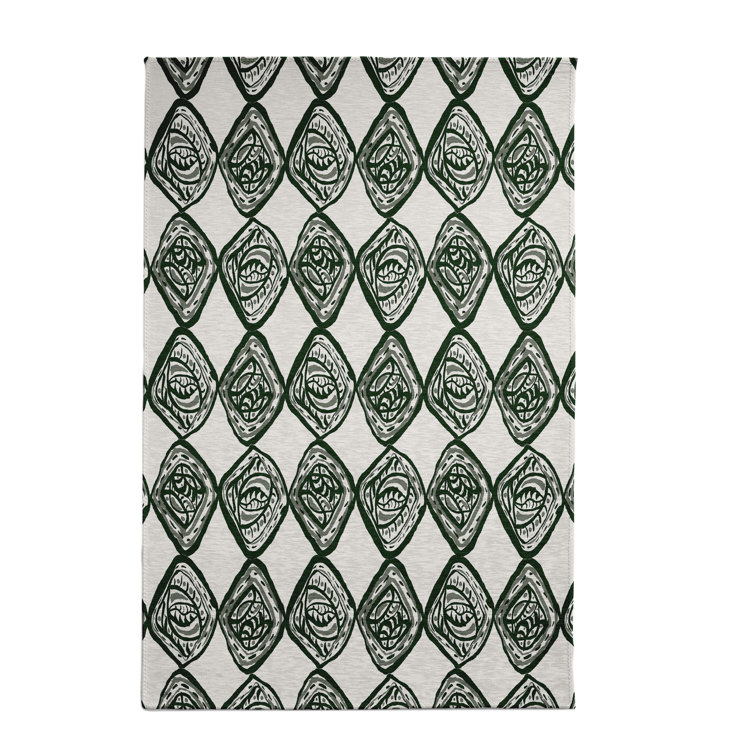 Tapis géométrique vert foncé