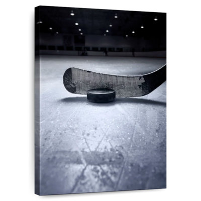 Bâton et rondelle de hockey monochrome
