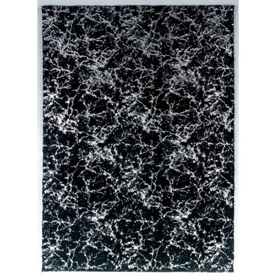 Tapis noir à motif abstrait Juiliana