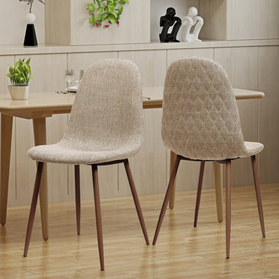 Élégante chaise de salle à manger en fer et en bois avec un tissu en polyester de qualité supérieure, idéale pour les repas à la maison
