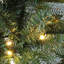 Sapin de Noël artificiel vert de 1,37 m (4,5 pi) préilluminé avec des DEL blanc chaud et un pot en plastique noir
