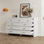Commode blanche à neuf tiroirs - Rangement spacieux avec poignées noires et glissières lisses
