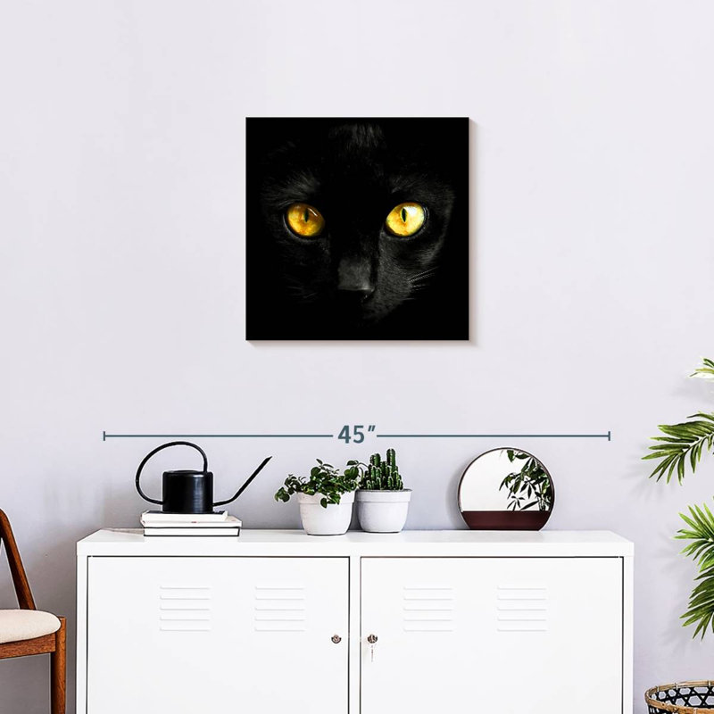 Chat noir aux yeux jaunes Brampt, H 20 po x l 20 po
