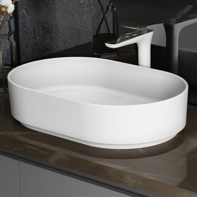 Lavabo à surface solide - blanc mat. Contemporain. Facile à nettoyer. 22,62 po Profondeur, 15,06 de largeur, 5,23 de hauteur. 16,81 lb Poids. Sans égouttoir ni piédestal, pour un style épuré et contemporain. Non