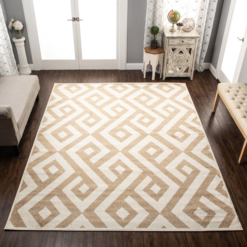 Ivory Geometric Synthetic 5'x8' Rectangular Area Rug