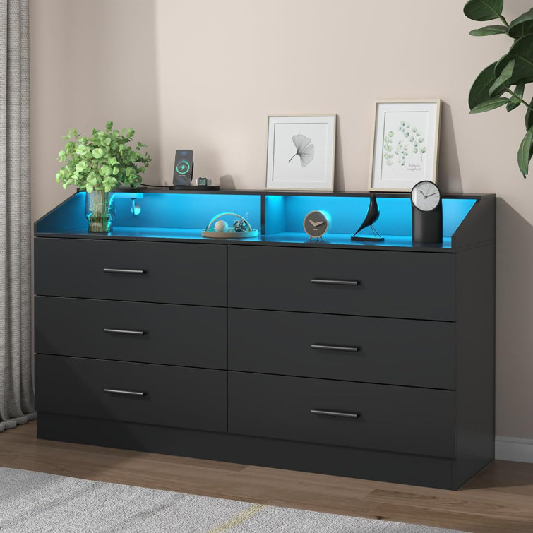 https://assets.wfcdn.com/im/45355210/resize-h755-w755%5Ecompr-r85/2589/258992813/Vikky+6+Drawers+Dresser+with+Power+Outlet%2C+Chest+of+Drawers+with+LED+Light%2C+Modern+Dresser+Organizer.jpg