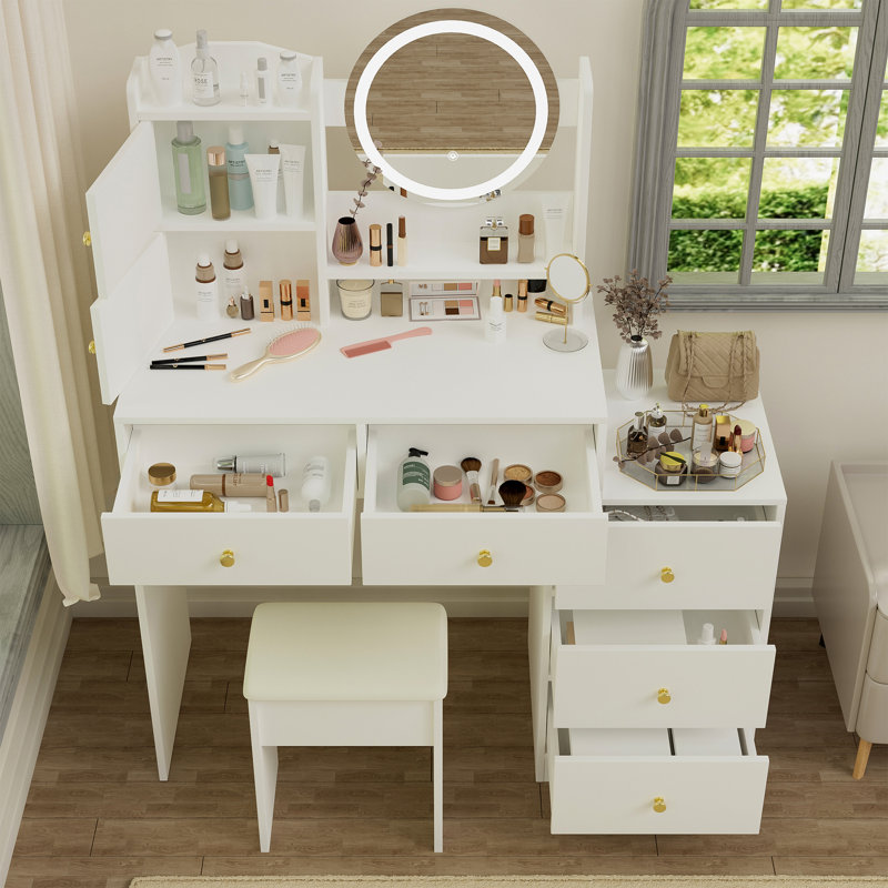 Bureau de coiffeuse avec fauteuil rembourré et miroir lumineux