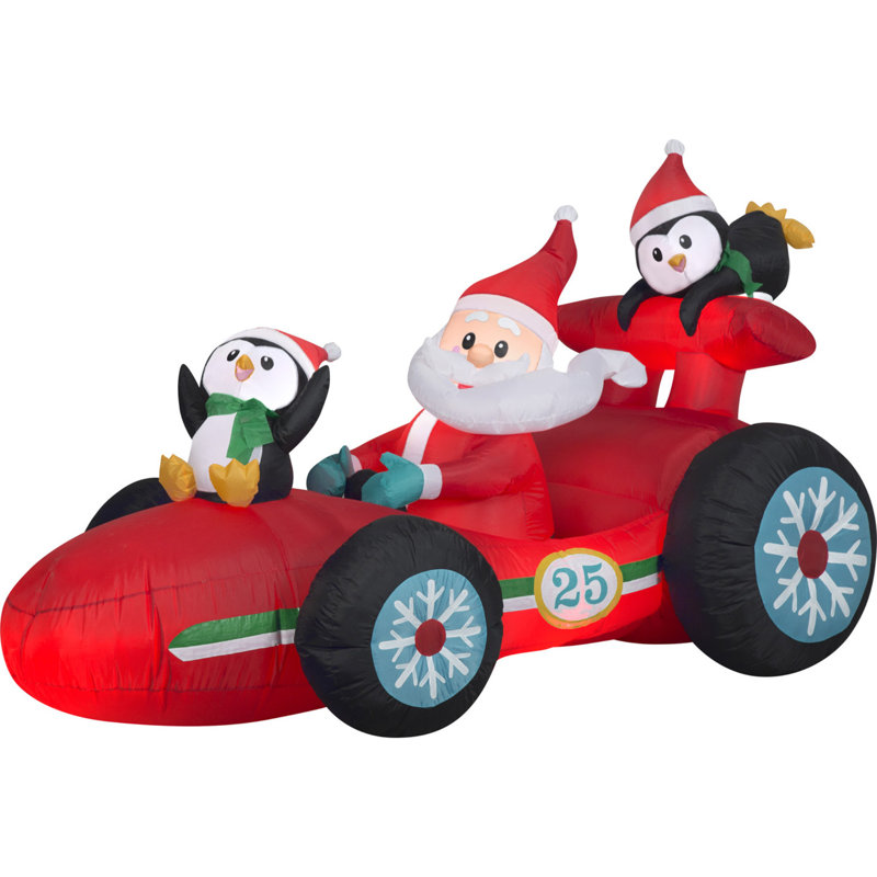 Père Noël en voiture de course gonflable