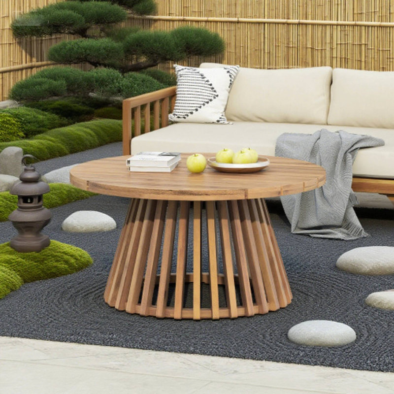 Table basse en bois d'acacia avec construction durable et conception résistante aux intempéries, parfaite pour les réceptions en plein air
