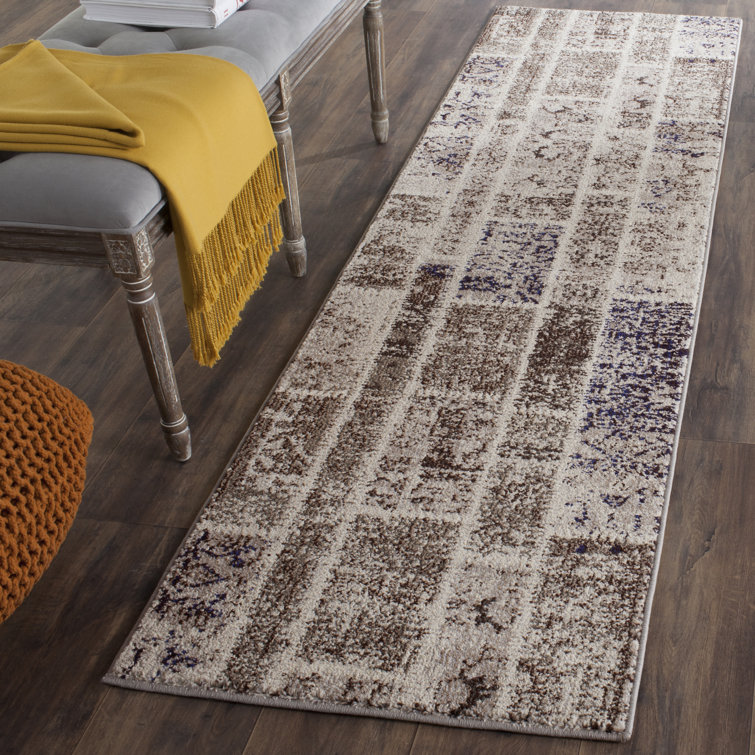 Tapis beige à motif géométrique Amrane