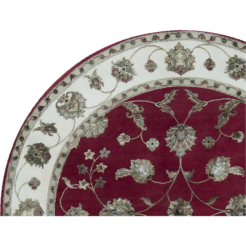 Tapis rond rouge et ivoire de haute qualité noué à la main