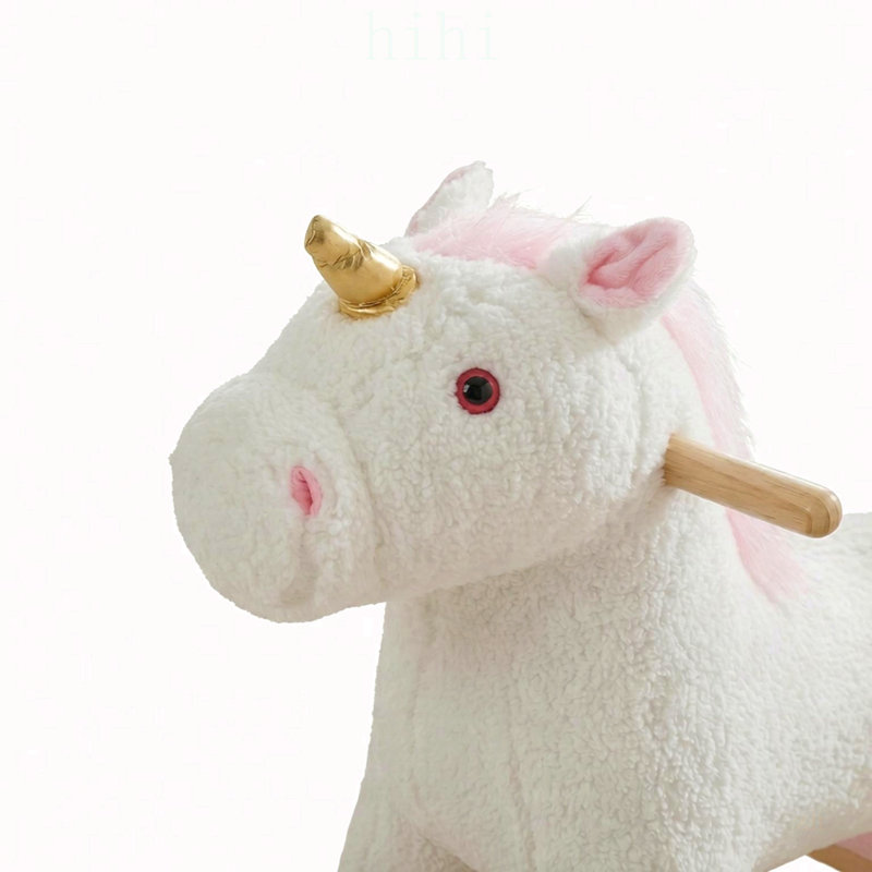 Licorne à bascule en peluche interactive adaptée aux tout-petits, un jeu sécuritaire et stimulant pour le développement musculaire et l'équilibre.