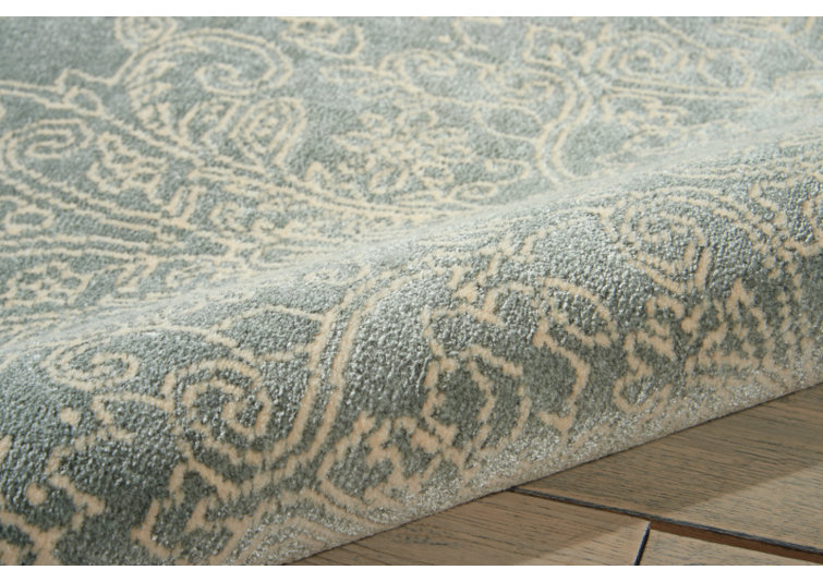 Platine Floral Area Rug in Marine/Beige