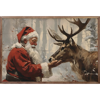 Père Noël avec renne