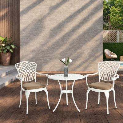 Ensemble bistro 3 pièces - table et chaises en fonte d'aluminium avec coussins réglables pour les pieds