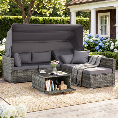 Ensemble de meubles de patio 7 pièces Latitude Run®, lit de jour en rotin avec auvent rétractable, ensemble de canapé modulaire d'extérieur avec dossier réglable, chaise longue pour la piscine