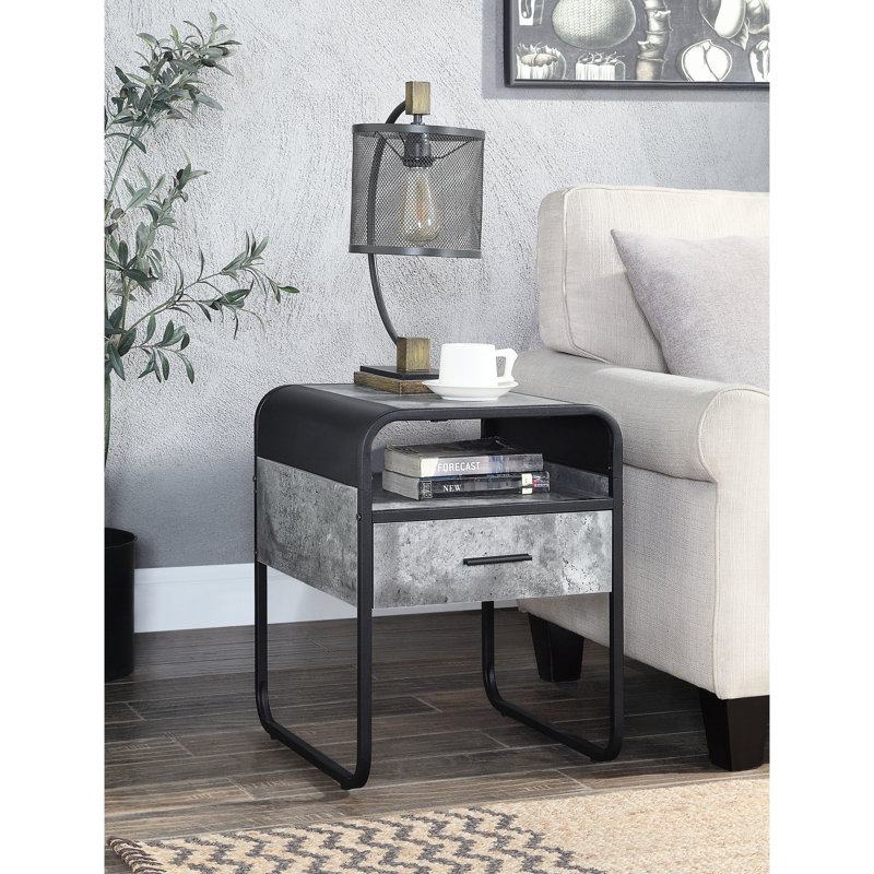 Table de bout élégante en béton gris et noir avec un tiroir fonctionnel pour l'organisation des chambres à coucher avec fonction