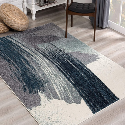 Tapis blanc et bleu à motif abstrait 5 pi x 8 pi Mcconatha