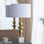 Lampe de table dorée et blanche avec corps rond à quatre niveaux (ampoule non incluse)