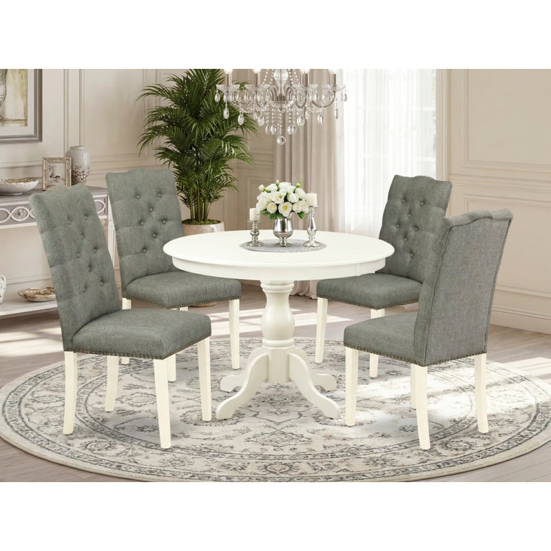 L'ensemble 5 pièces de table et chaises de cuisine comprend une table de salle à manger ronde avec piédestal et 4 chaises de salle à manger Parson en tissu gris, lin blanc