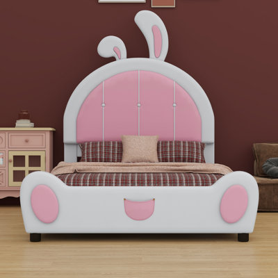 Lit plateforme tapissier avec tête de lit en forme de lapin