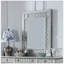 Miroir mural chic à finition champagne argenté avec construction durable et installation facile, parfait pour les intérieurs modernes