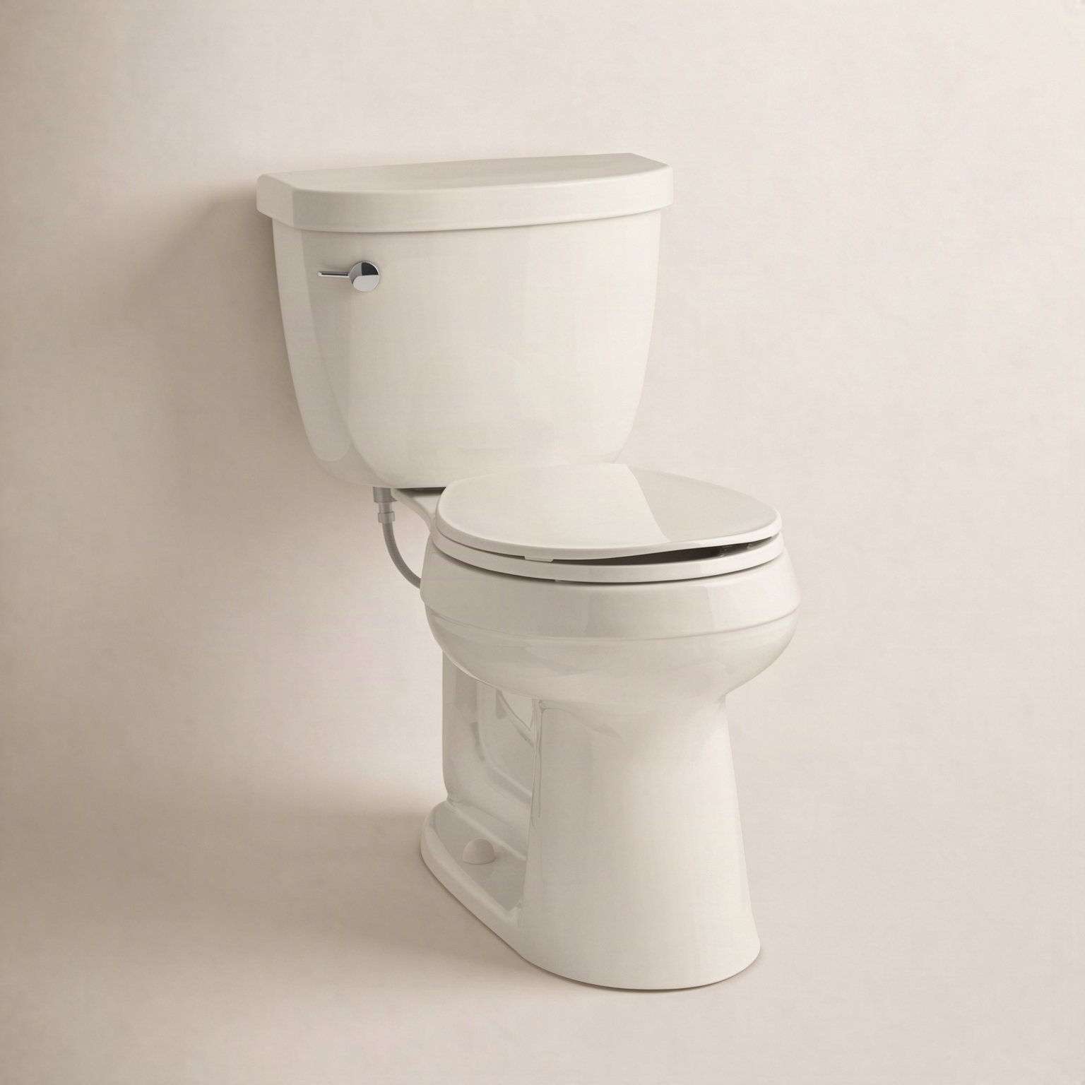 Cimarron 1.6 GPF 2-Piece Round Toilet, Biscuit, Left-Hand
