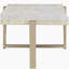 Table basse blanche et champagne