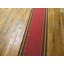 Tapis de couloir rouge très long à bordure rouge