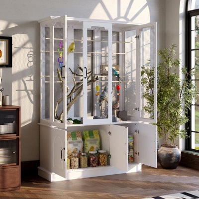 Grande cage à oiseaux blanche sur pied avec panneaux de grille et armoire de rangement inférieure