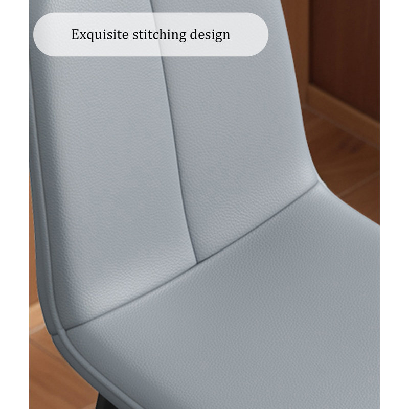 Chaise moderne et simple à dossier en cuir