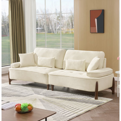 Canapé confortable à assise profonde avec coussin moelleux, idéal pour divers espaces
