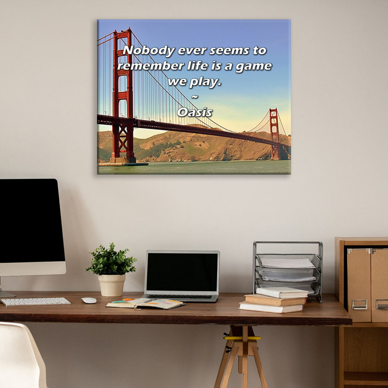Citation artistique «Personne ne semble se souvenir que la vie est un jeu auquel nous jouons». Toile tendue par By Oasis Gallery