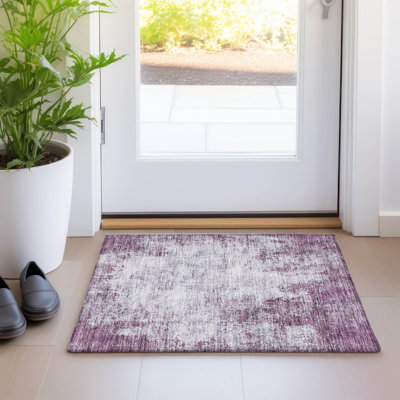 Tapis rectangulaire Aleighna avec envers antidérapant