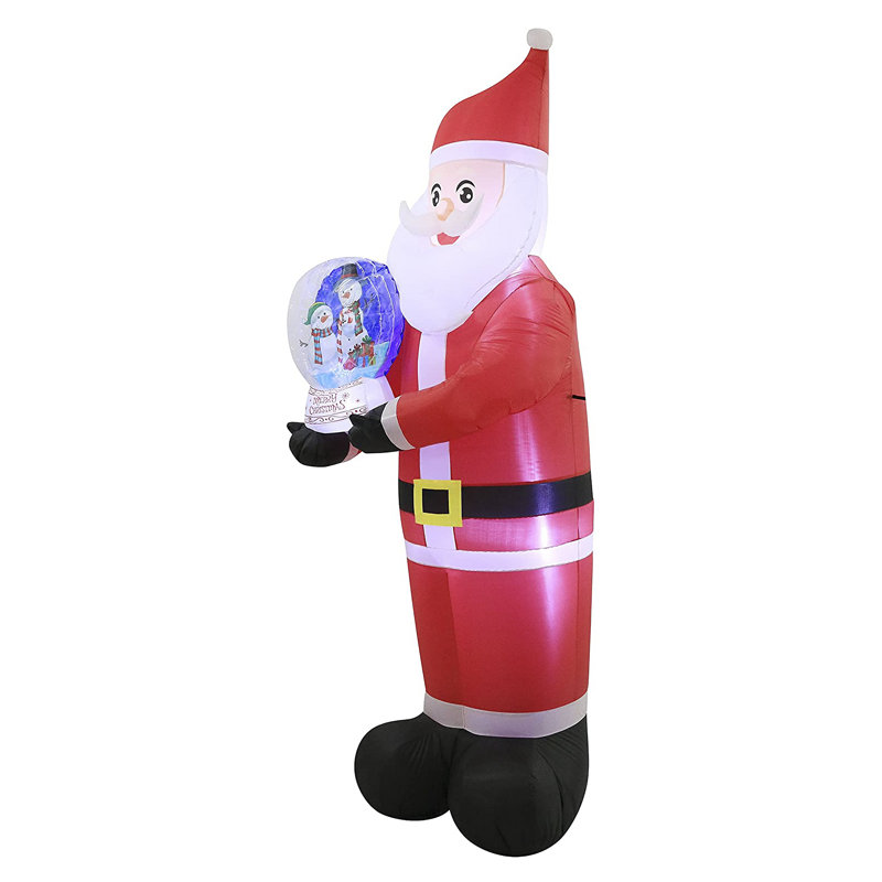 Père Noël tenant une boule à neige gonflable de Noël