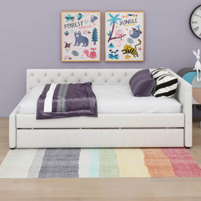 Lit plateforme tapissier double capitonné avec lit gigogne simple TG