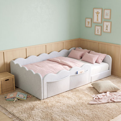 Lit tapissier au sol avec tissu en peluche doux et garde-corps