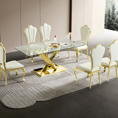 Table de salle à manger 69,1 pouces avec plateau en verre trempé transparent doré, pieds, style contemporain, table rectangulaire en acier inoxydable avec plateau optimisée pour l'espace, construction robuste, attrait élégant, pratique