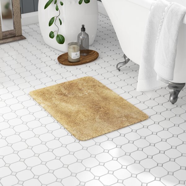 https://assets.wfcdn.com/im/45485779/resize-h600-w600%5Ecompr-r85/7813/78138128/Herrmann+Bath+Rug+with+Non-Slip+Backing.jpg